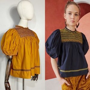 Ulla Johnson “Arden” smocked embroidered cotton-poplin blouse in marigold yellow